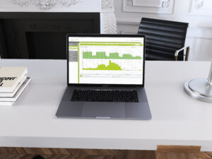 Laptop showing enerchart in office 